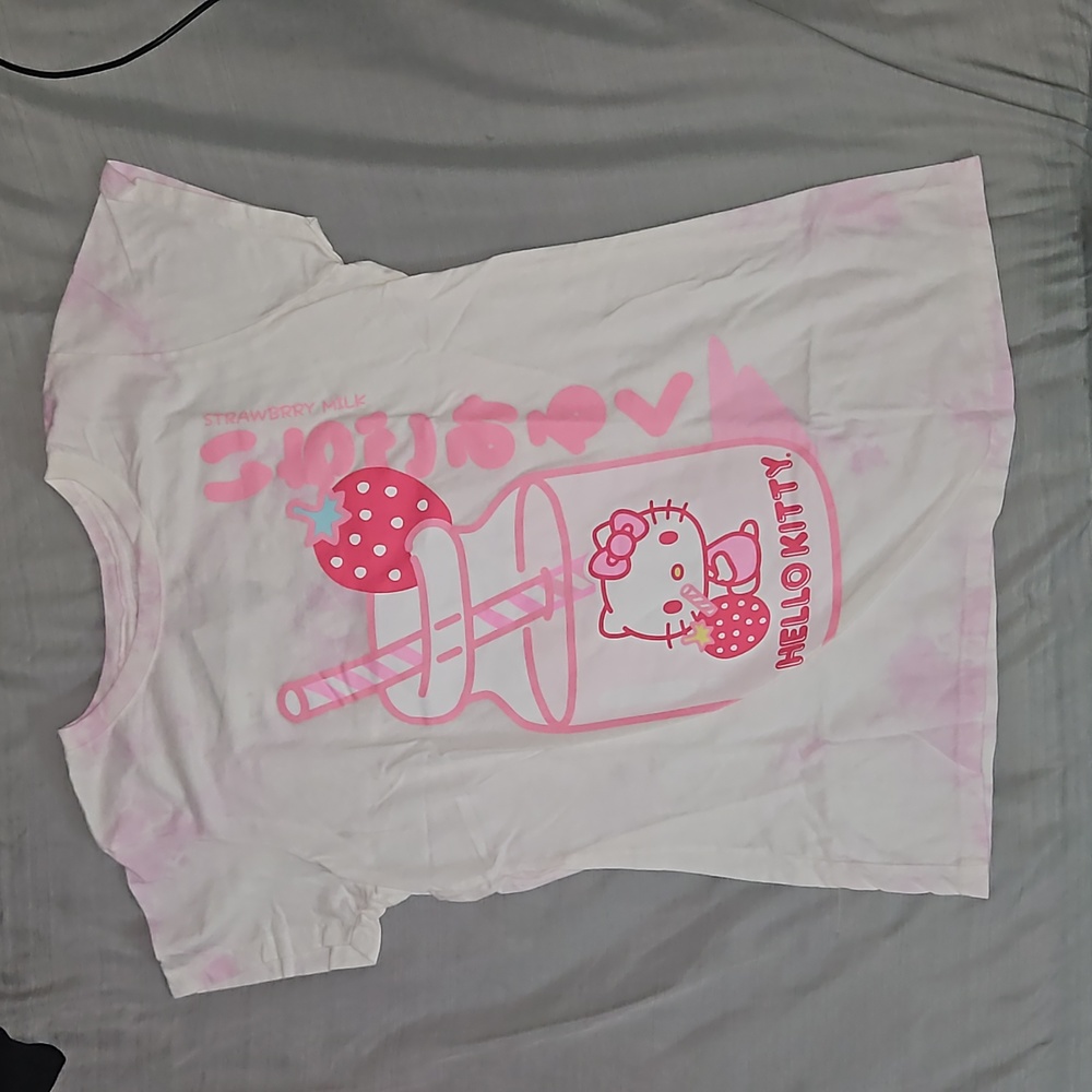 A pink Hot Topic Hello Kitty graphic t-shirt. Size Large. New with tags.